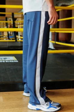 Pantalon jogging large à bandes