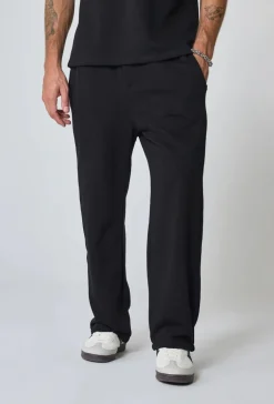 Pantalon jogging uni ample décontracté et confortable