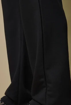Pantalon jogging uni ample décontracté et confortable