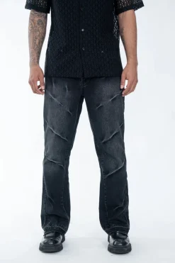 Pantalon noir délavé à détails