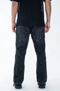 Pantalon noir délavé à détails
