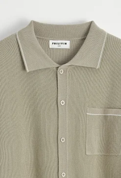 Polo avec détail à rayure