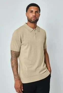 Polo boutonné manches courtes uni en maille
