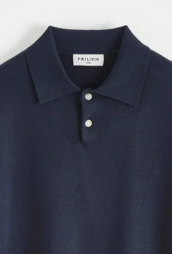 Polo boutonné manches courtes uni en maille