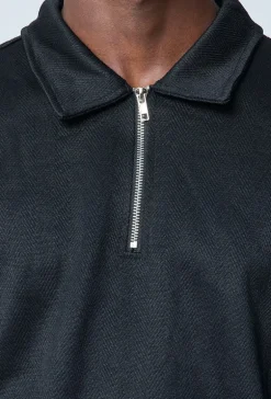 Polo couleur uni manche longue à zip