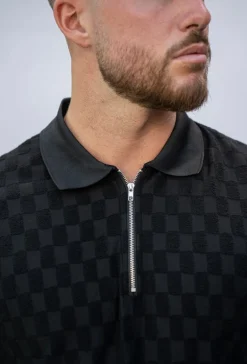 Polo manches courtes à motif carreaux