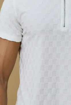 Polo manches courtes à motif carreaux