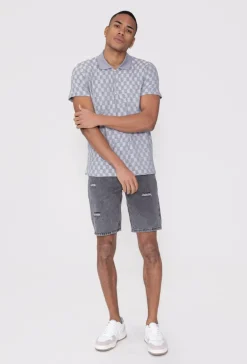 Polo manches courtes à motif carreaux