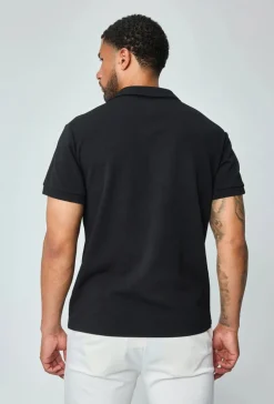 Polo uni à manches courtes