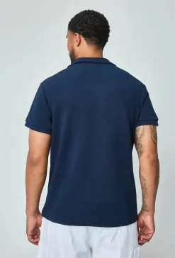 Polo uni à manches courtes