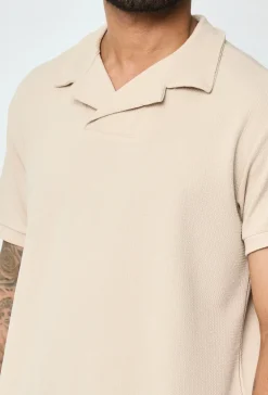 Polo uni à manches courtes