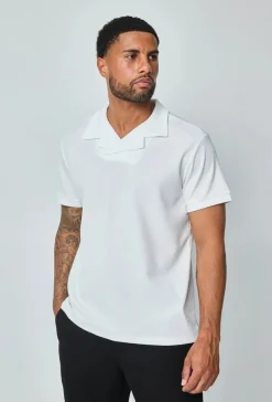 Polo uni à manches courtes
