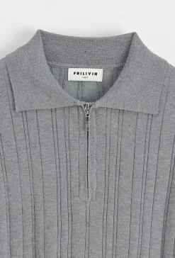 Polo uni effet rayé