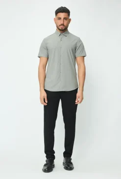 Polo uni manche court col ouvert