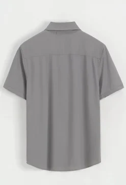 Polo uni manche court col ouvert