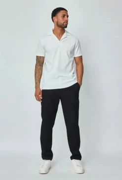 Polo uni manches courtes
