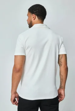 Polo uni manches courtes