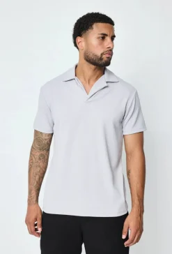 Polo uni manches courtes
