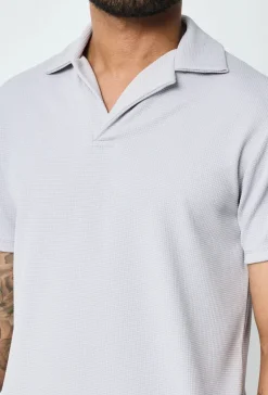 Polo uni manches courtes
