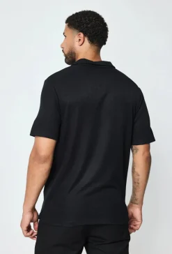 Polo uni manches courtes