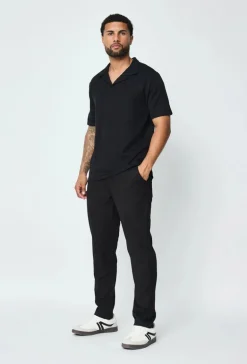 Polo uni manches courtes