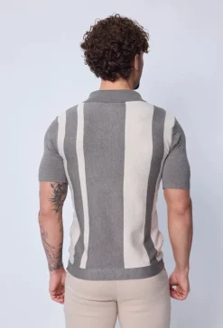 Polo zippé à rayures latérales