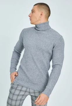Pull col roulé maille cotelé