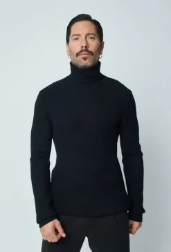 Pull col roulé maille cotelé