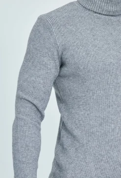 Pull col roulé maille cotelé