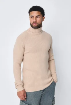 Pull col roulé maille cotelé