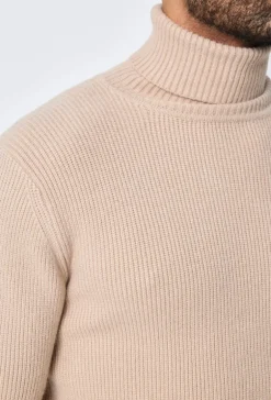 Pull col roulé maille cotelé
