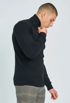 Pull col roulé maille cotelé