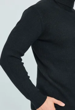 Pull col roulé maille cotelé