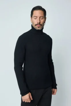 Pull col roulé maille cotelé