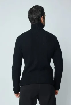 Pull col roulé maille cotelé