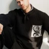 Pull en maille effet fausse poche