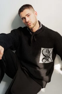 Pull en maille effet fausse poche