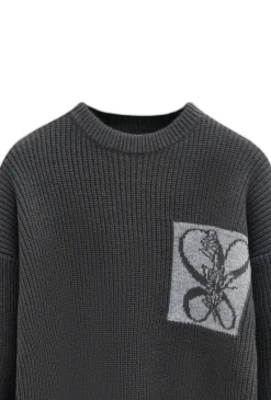 Pull en maille effet fausse poche
