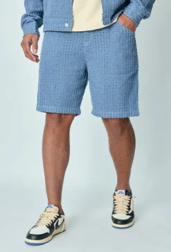 Short droit à motifs troués