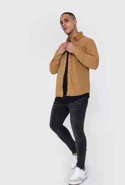 Surchemise jean cintrée à col classique avec finition usée