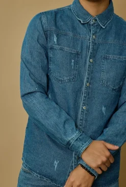 Surchemise jean cintrée à col classique avec finition usée