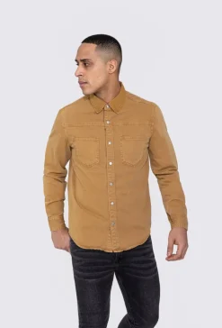 Surchemise jean cintrée à col classique avec finition usée
