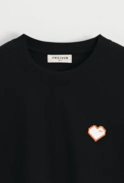 T-shirt uni à coeur