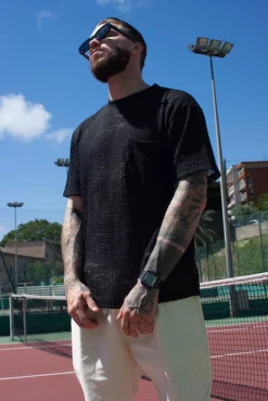 T-shirt uni en maille transparente manches courtes col rond