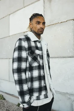 Veste à carreaux avec col mouton