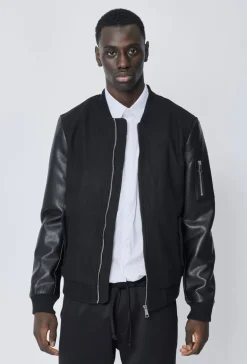 Veste avec manche simili cuire