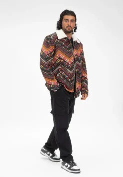 Veste avec un mélange de motifs géométriques colorés