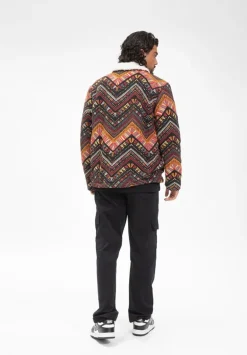 Veste avec un mélange de motifs géométriques colorés