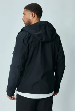 Veste courte à capuche réglable avec ficelle