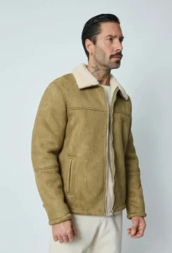 Veste en daim à zip col ouvert en moumoute